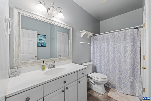 1972 Sclaters Ford Rd, Palmyra, VA 22963 - bathroom with toilet, vanity, and curtained shower