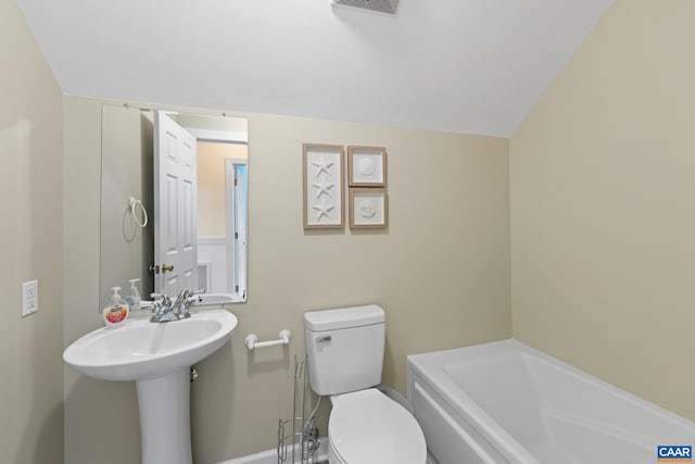 1972 Sclaters Ford Rd, Palmyra, VA 22963 - full bathroom featuring toilet, a tub, and baseboards