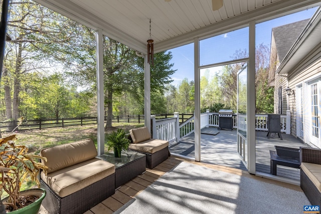 1972 Sclaters Ford Rd, Palmyra, VA 22963 - sunroom / solarium featuring plenty of natural light, outdoor lounge area, a ceiling fan, and view of scattered trees