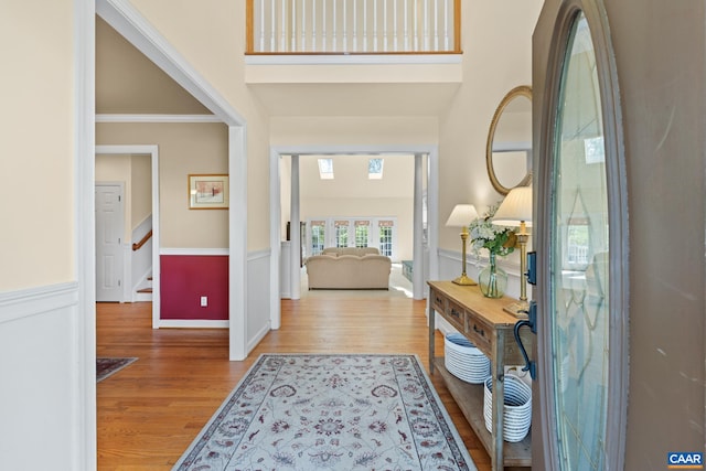 1972 Sclaters Ford Rd, Palmyra, VA 22963 - foyer entrance featuring wood finished floors, stairs, baseboards, and a towering ceiling