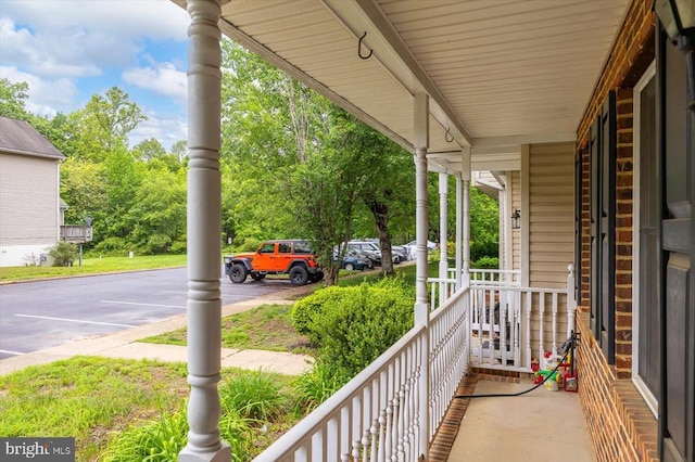 9814 Dominion Forest Cir, Fredericksburg, VA 22408 - balcony featuring covered porch