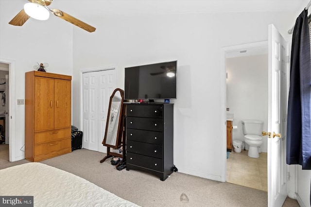 9814 Dominion Forest Cir, Fredericksburg, VA 22408 - bedroom with carpet, a closet, connected bathroom, and baseboards