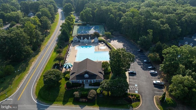 9814 Dominion Forest Cir, Fredericksburg, VA 22408 - view from above of property featuring a pool and a heavily wooded area