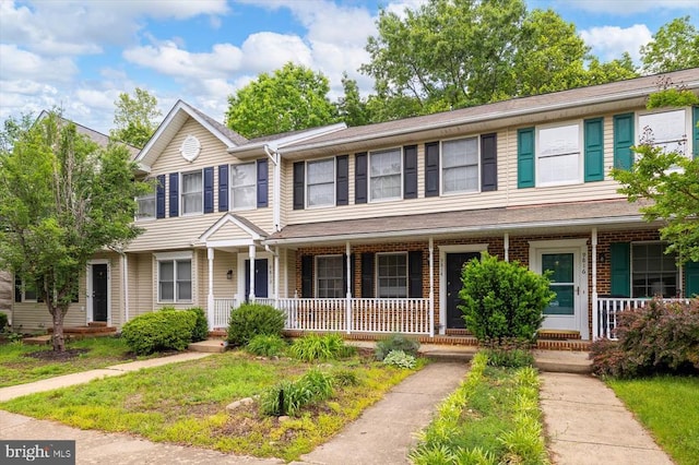9814 Dominion Forest Cir, Fredericksburg, VA 22408 - townhome / multi-family property with a porch