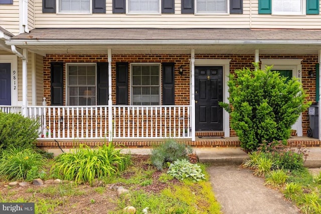 9814 Dominion Forest Cir, Fredericksburg, VA 22408 - doorway to property with a porch