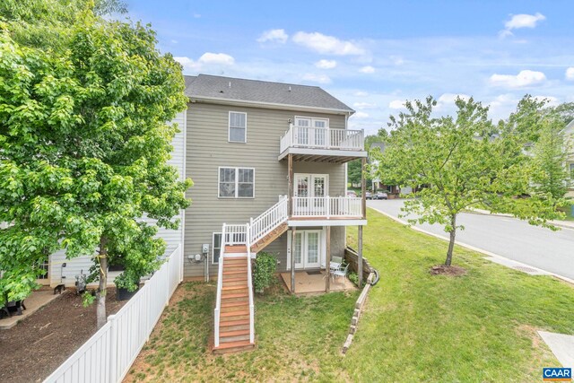2153 Saranac Ct, Charlottesville, VA 22911 - view of front of house featuring a front lawn, french doors, a deck, and stairs