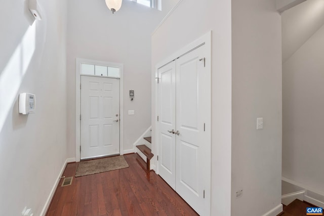 2153 Saranac Ct, Charlottesville, VA 22911 - entrance foyer with baseboards, dark wood-style flooring, a healthy amount of sunlight, visible vents, and a towering ceiling