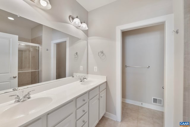 2153 Saranac Ct, Charlottesville, VA 22911 - full bathroom featuring a sink, a stall shower, visible vents, and tile patterned floors