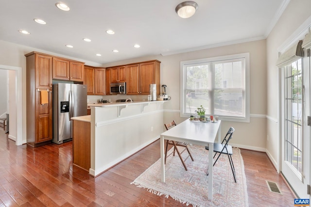 2153 Saranac Ct, Charlottesville, VA 22911 - kitchen with recessed lighting, visible vents, a peninsula, and appliances with stainless steel finishes