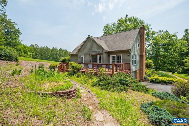168 Lakeland Ln, Faber, VA 22938 - view of front of property featuring a deck, asphalt driveway, and a shingled roof