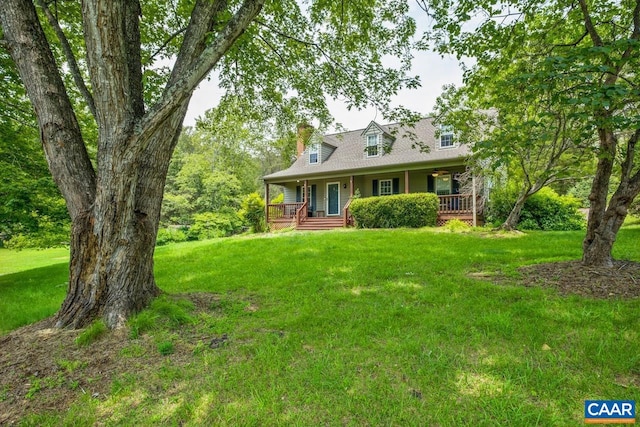 168 Lakeland Ln, Faber, VA 22938 - cape cod home featuring covered porch, a front lawn, and a chimney