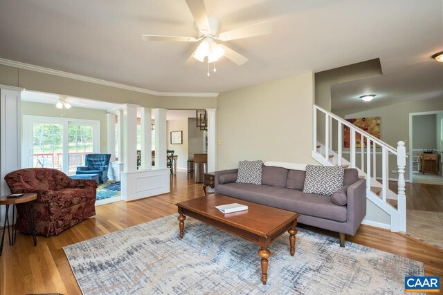 168 Lakeland Ln, Faber, VA 22938 - living room with a ceiling fan, stairs, wood finished floors, and ornamental molding