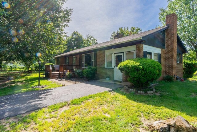 9274 Spotswood Trl, Mcgaheysville, VA 22840 - ranch-style house with brick siding, a front yard, and a chimney