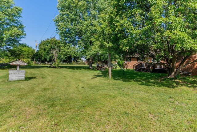 9274 Spotswood Trl, Mcgaheysville, VA 22840 - view of green lawn featuring a wooden deck
