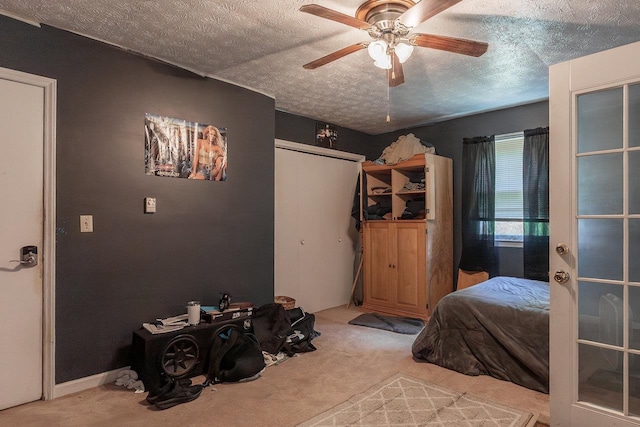 9274 Spotswood Trl, Mcgaheysville, VA 22840 - bedroom featuring light carpet, a textured ceiling, a closet, and ceiling fan