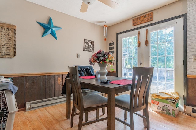9274 Spotswood Trl, Mcgaheysville, VA 22840 - dining area with light wood-type flooring, a baseboard heating unit, and ceiling fan