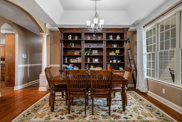 1763 Red Top Orchard Rd, Waynesboro, VA 22980 - dining room with a chandelier, arched walkways, wood finished floors, a tray ceiling, and crown molding