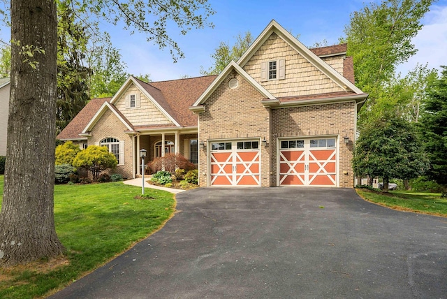1763 Red Top Orchard Rd, Waynesboro, VA 22980 - craftsman-style home with driveway, a front yard, brick siding, and an attached garage