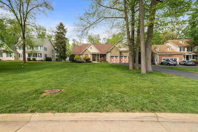 1763 Red Top Orchard Rd, Waynesboro, VA 22980 - view of front facade with a garage, asphalt driveway, a front yard, and a residential view