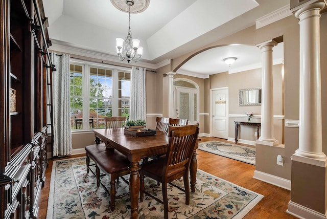 1763 Red Top Orchard Rd, Waynesboro, VA 22980 - dining area with decorative columns, arched walkways, wood finished floors, ornamental molding, and baseboards
