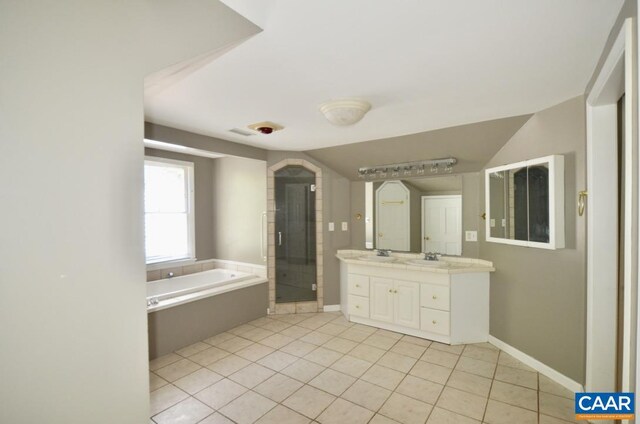 1895 Westview Rd, Charlottesville, VA 22903 - bathroom featuring tile patterned floors, a shower stall, a bath, double vanity, and lofted ceiling