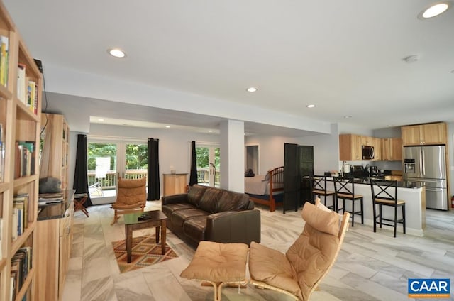 living room featuring recessed lighting