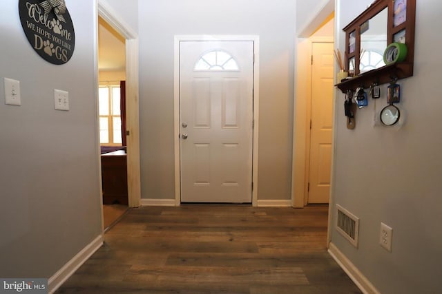 interior space with dark hardwood / wood-style flooring