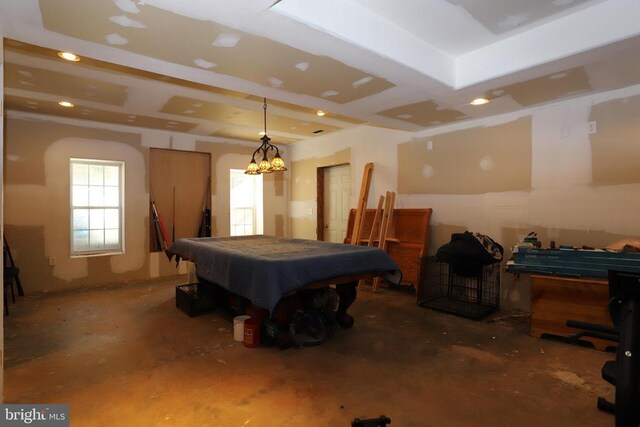 recreation room with concrete floors