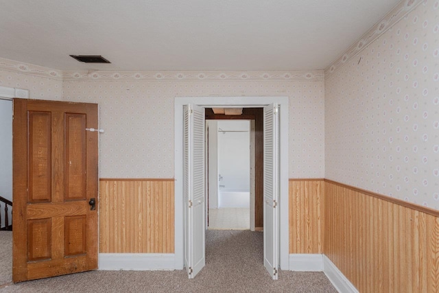 1221 Keezletown Rd, Weyers Cave, VA 24486 - hall with a wainscoted wall, wallpapered walls, carpet, and wood walls