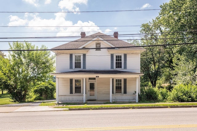1221 Keezletown Rd, Weyers Cave, VA 24486 - view of front of house featuring a porch and a chimney
