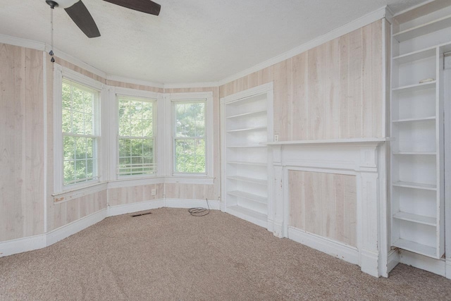 1221 Keezletown Rd, Weyers Cave, VA 24486 - unfurnished sunroom featuring carpet floors, wooden walls, and crown molding