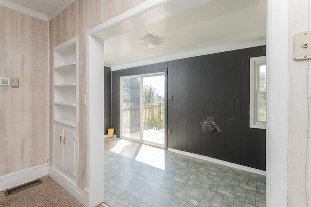 1221 Keezletown Rd, Weyers Cave, VA 24486 - unfurnished room with wood walls and ornamental molding