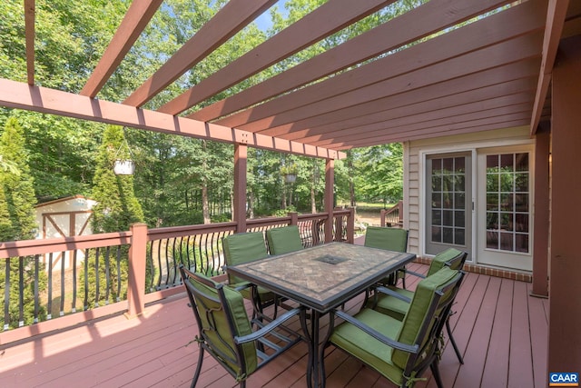 797 Willow Ridge Rd, Troy, VA 22974 - wooden deck with outdoor dining area, a storage shed, and a pergola