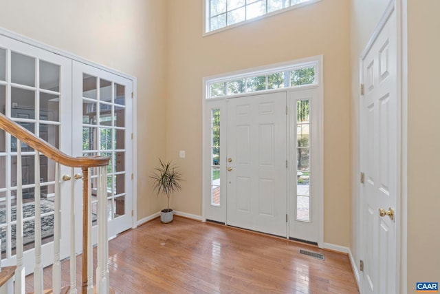 797 Willow Ridge Rd, Troy, VA 22974 - entryway featuring wood finished floors, a towering ceiling, and french doors