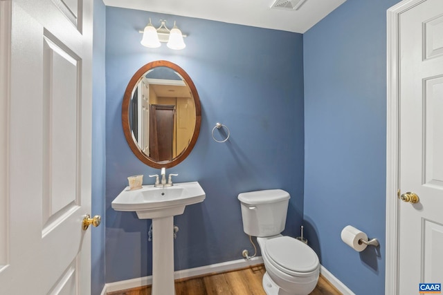 797 Willow Ridge Rd, Troy, VA 22974 - half bath with toilet and wood finished floors