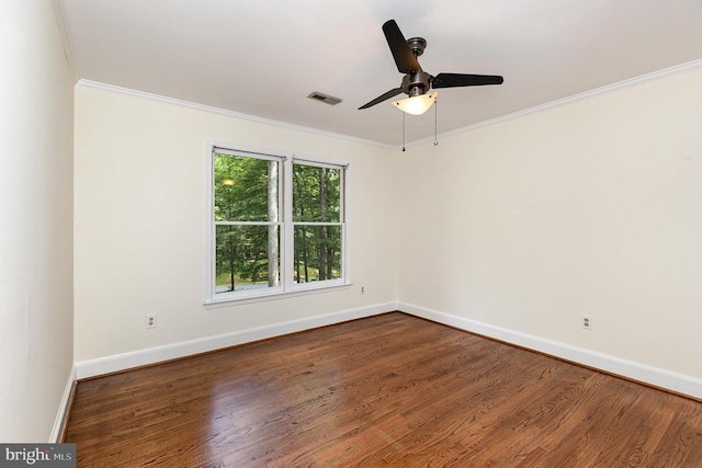  - unfurnished room featuring ornamental molding, wood finished floors, and a ceiling fan