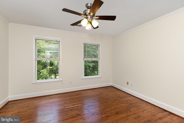  - empty room with wood finished floors, ornamental molding, and a ceiling fan