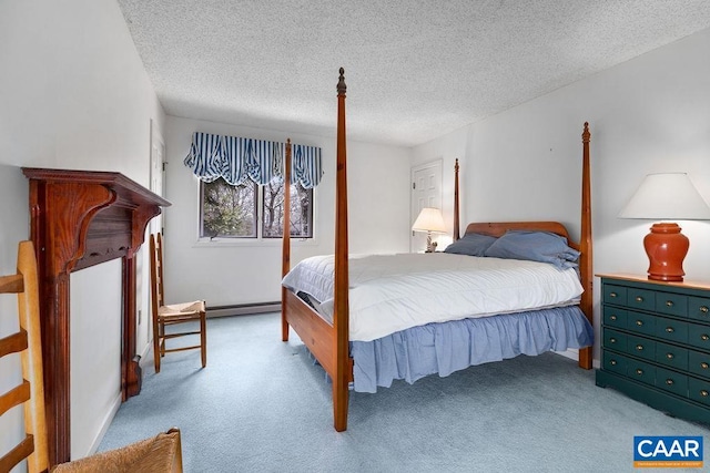 carpeted bedroom with a textured ceiling