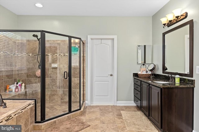 11135 Vanderbilt Cv, Spotsylvania, VA 22551 - full bath with a shower stall, baseboards, and vanity