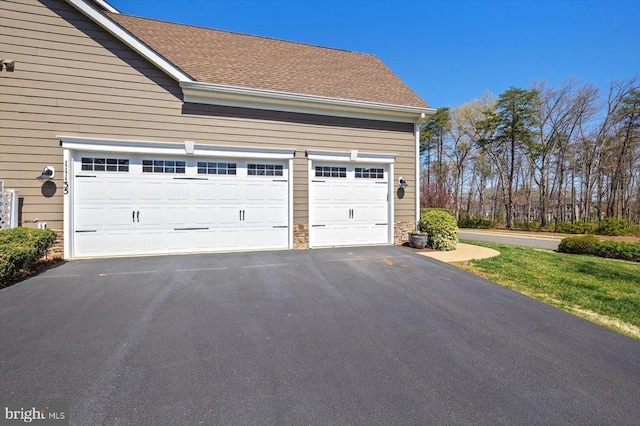11135 Vanderbilt Cv, Spotsylvania, VA 22551 - garage featuring asphalt driveway