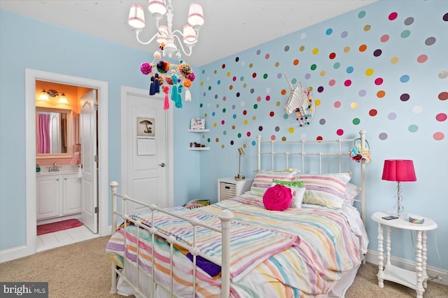 11135 Vanderbilt Cv, Spotsylvania, VA 22551 - bedroom featuring a chandelier, light carpet, baseboards, and a sink