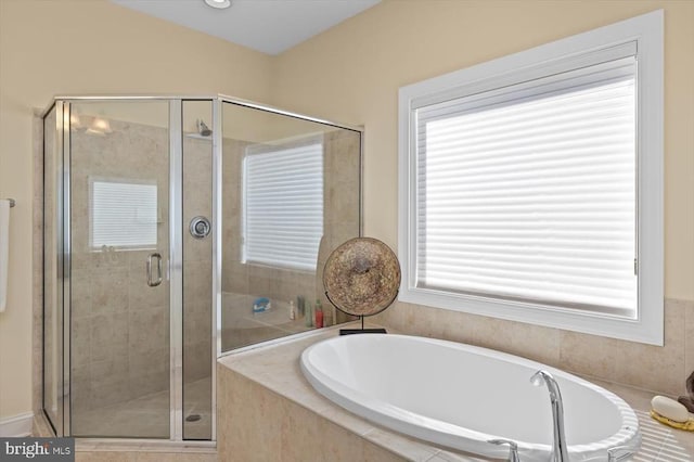 11135 Vanderbilt Cv, Spotsylvania, VA 22551 - full bath featuring a shower stall and a garden tub