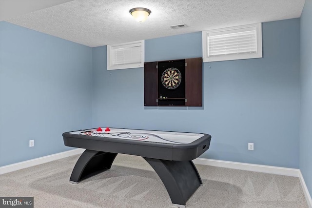 11135 Vanderbilt Cv, Spotsylvania, VA 22551 - recreation room featuring baseboards, carpet floors, and a textured ceiling