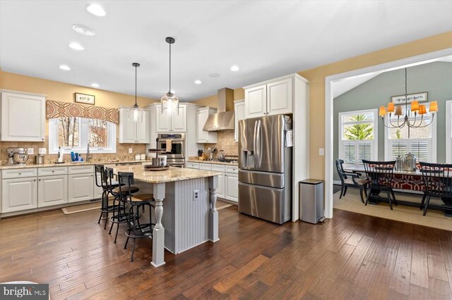 11135 Vanderbilt Cv, Spotsylvania, VA 22551 - kitchen featuring stainless steel appliances, a chandelier, white cabinets, decorative backsplash, and recessed lighting