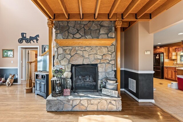 796 Battlecreek Rd, Stanley, VA 22851 - living area featuring light wood-type flooring, visible vents, a fireplace, and baseboards