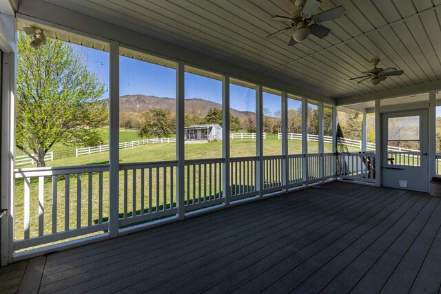 796 Battlecreek Rd, Stanley, VA 22851 - unfurnished sunroom featuring a ceiling fan and a mountain view