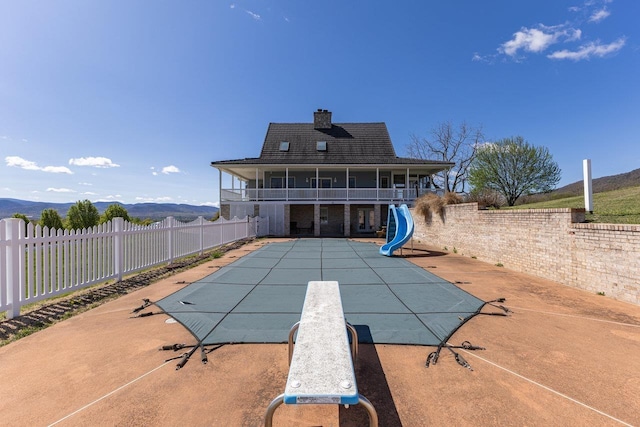 796 Battlecreek Rd, Stanley, VA 22851 - view of swimming pool with a patio area, a water slide, a fenced in pool, and a fenced backyard