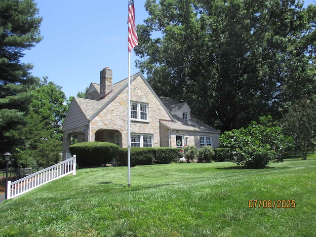 835 Rosser Ave, Waynesboro, VA 22980 - tudor-style house featuring stone siding and a chimney