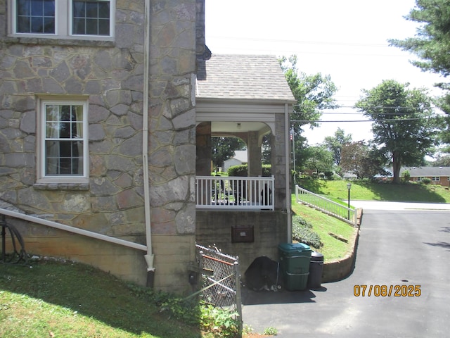 835 Rosser Ave, Waynesboro, VA 22980 - view of home's exterior with stone siding and roof with shingles