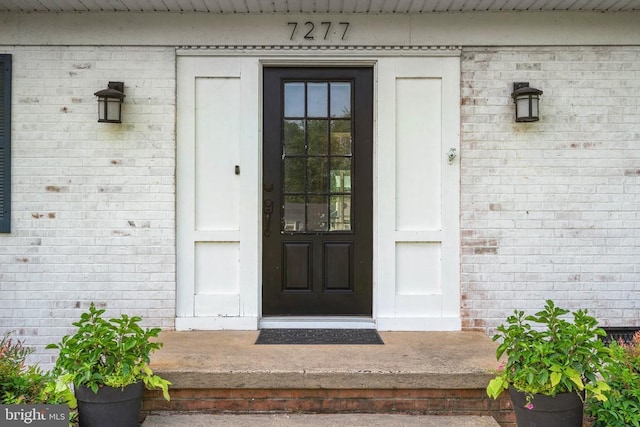  - entrance to property with brick siding